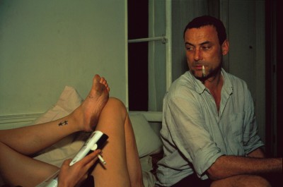 Bruno smoking a joint (with Valeries legs), Paris, 2001.jpg